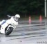 Japanese Motorcycle Police Skills on a Wet Surface